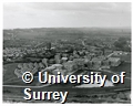 Aerial photograph of the University of Surrey Stag Hill Campus taken from above the railway tracks