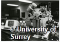 Photograph of a student working in a laboratory in the Department of Physics at the University of Surrey