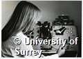 Photograph of a conducting experiments in a laboratory in the Department of Physics at the University of Surrey