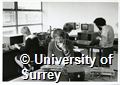 Photographs of students working in a laboratory in the Department of Physics at the University of Surrey